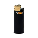 Briquet de la marque BIC et de couleur noir et doré